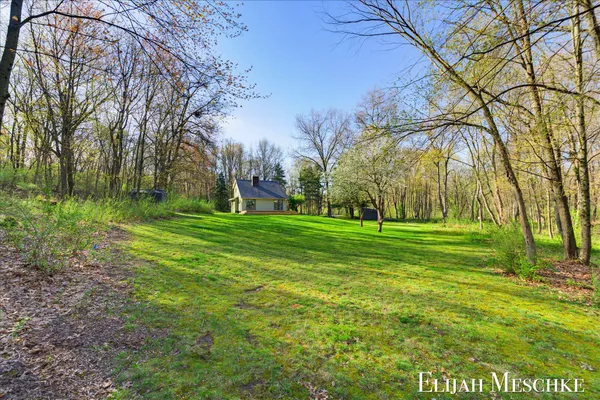 $649,900 | 9000 Crooked Crow Road Northeast, Ada, MI 49301