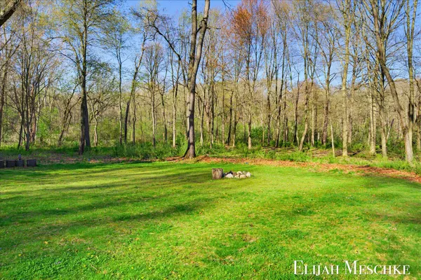 $649,900 | 9000 Crooked Crow Road Northeast, Ada, MI 49301