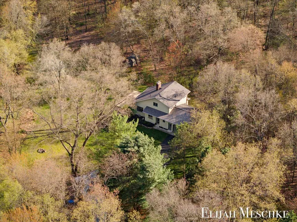 $649,900 | 9000 Crooked Crow Road Northeast, Ada, MI 49301