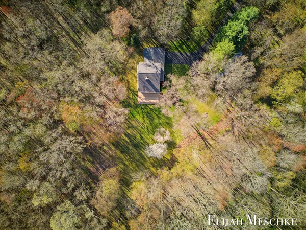 $649,900 | 9000 Crooked Crow Road Northeast, Ada, MI 49301
