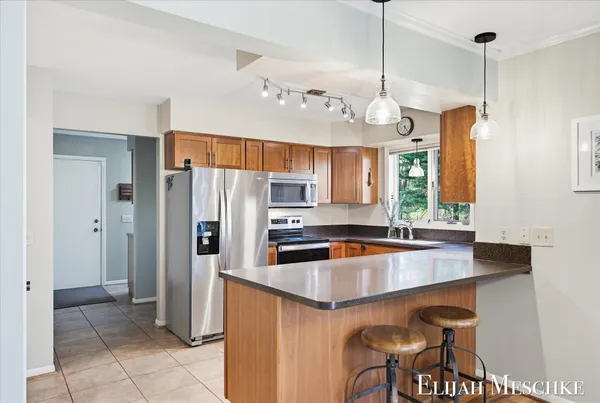 $649,900 | 9000 Crooked Crow Road Northeast, Ada, MI 49301