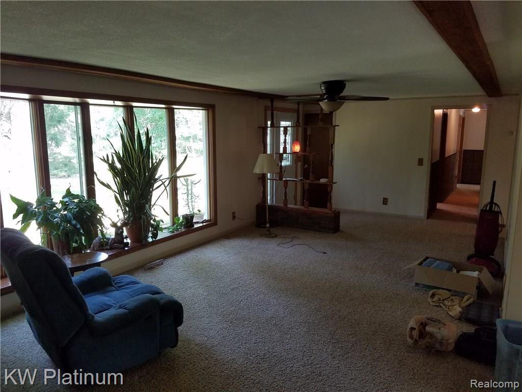 6244 Rynn Road North Street, MI 48049 - Photo 6 of 22 LARGE LIVING ROOM WITH LOTS OF NATURAL LIGHT