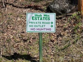 0 Tuckaway Road Waynesville, NC 28785 - Photo 2 of 3 a sign on the side of the road