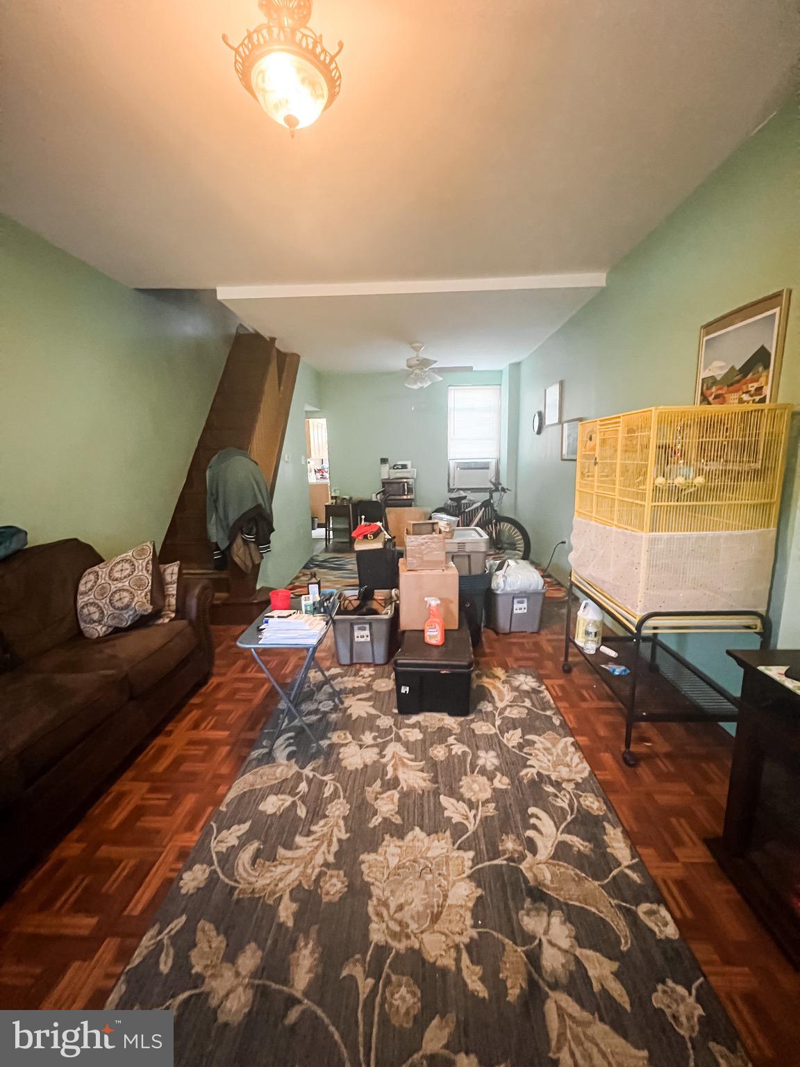 2834 East Venango Street Philadelphia, PA 19134 - Photo 2 of 10 a living room with lots of furniture and a flat screen tv