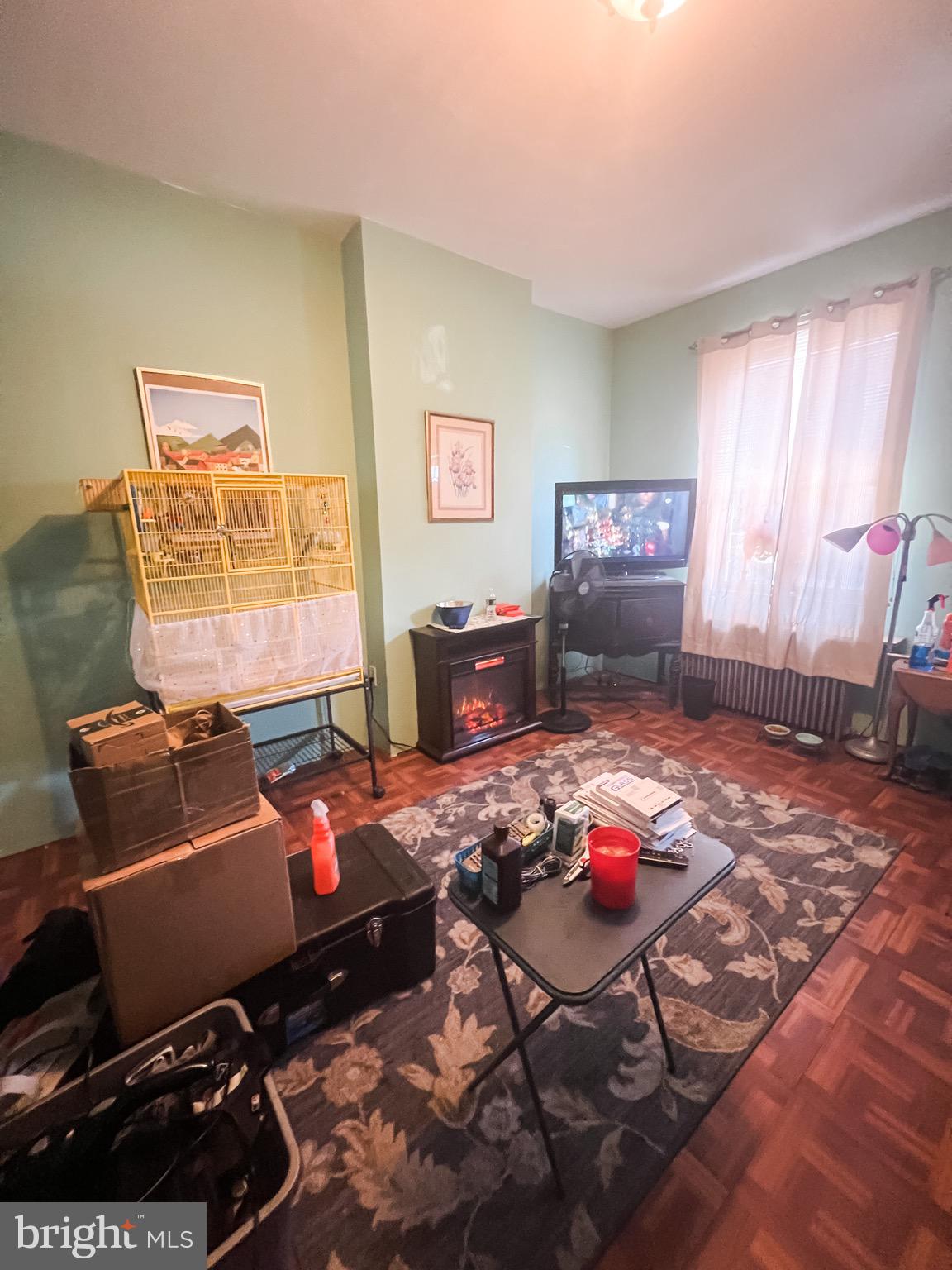 2834 East Venango Street Philadelphia, PA 19134 - Photo 3 of 10 a bedroom with furniture and a window