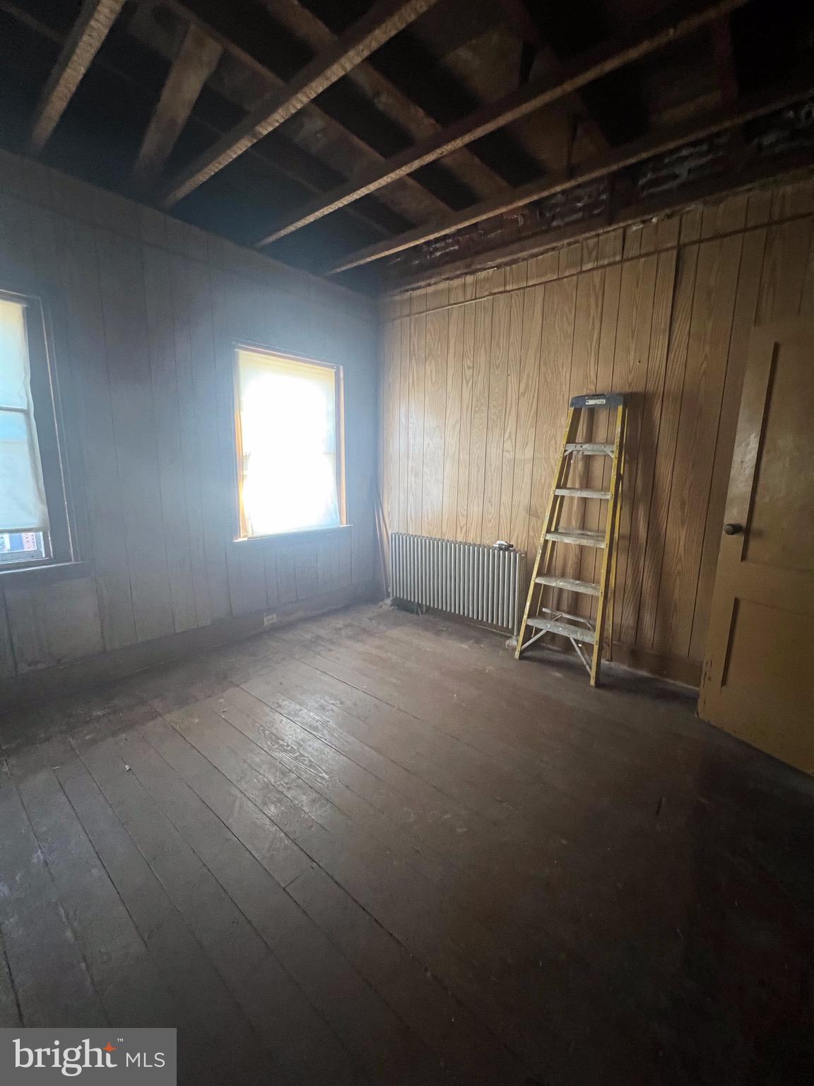2834 East Venango Street Philadelphia, PA 19134 - Photo 10 of 10 a view of empty room with wooden floor and fan