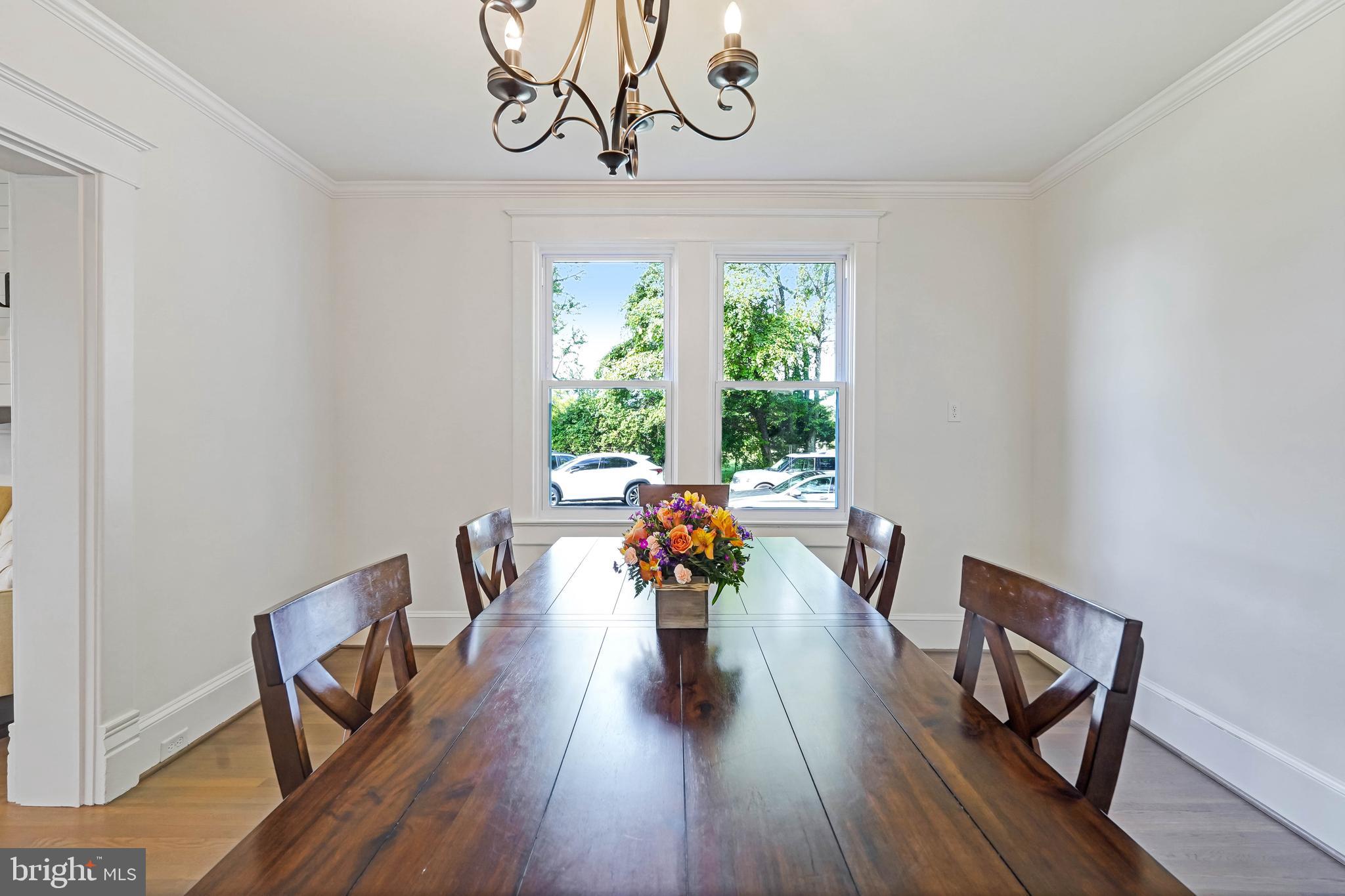 27100 Ridge Road Damascus, MD 20872 - Photo 12 of 74 a view of a dining room with furniture window and wooden floor