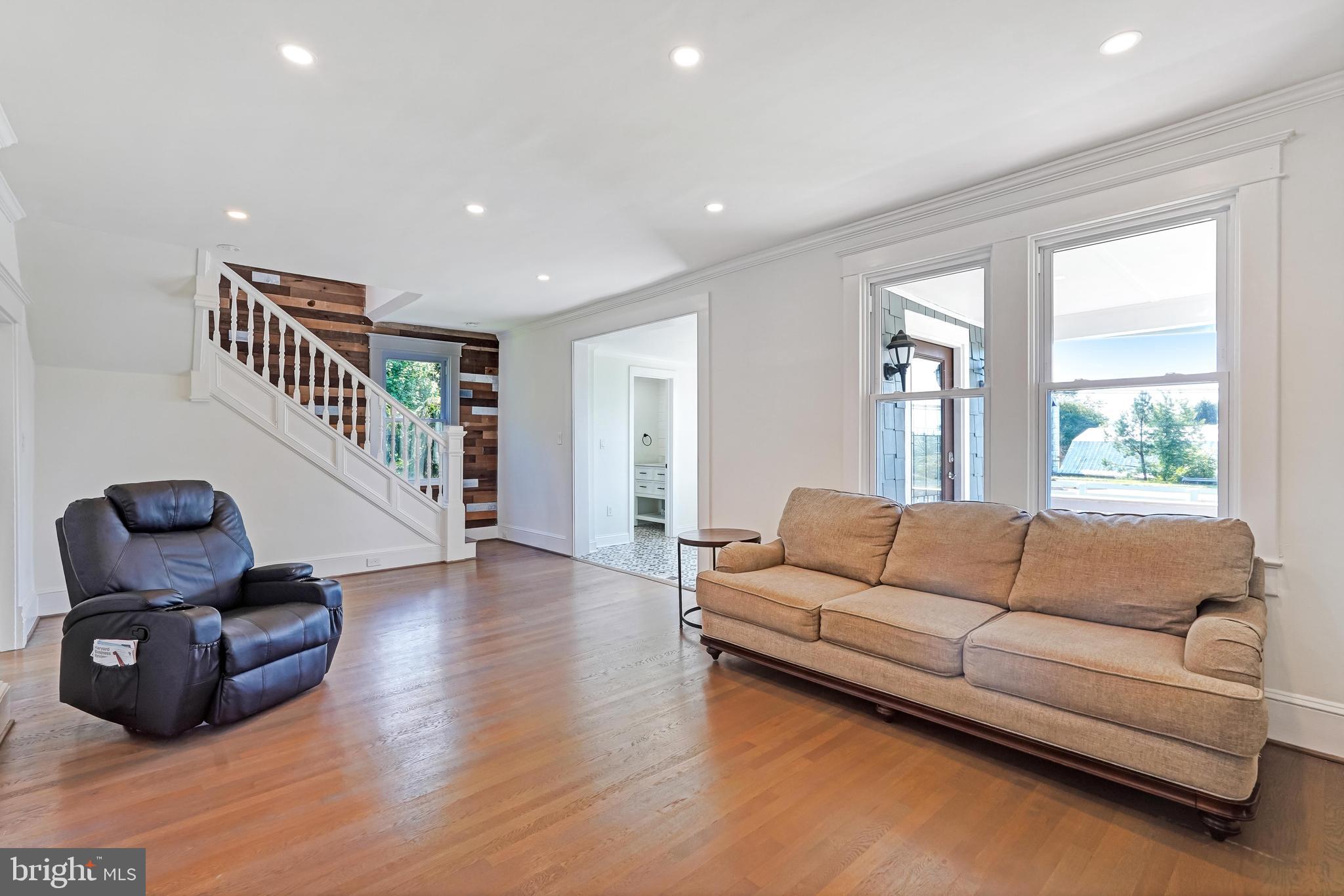 27100 Ridge Road Damascus, MD 20872 - Photo 19 of 74 Sun Filled Living Room w/ Wood-Burning Fireplace