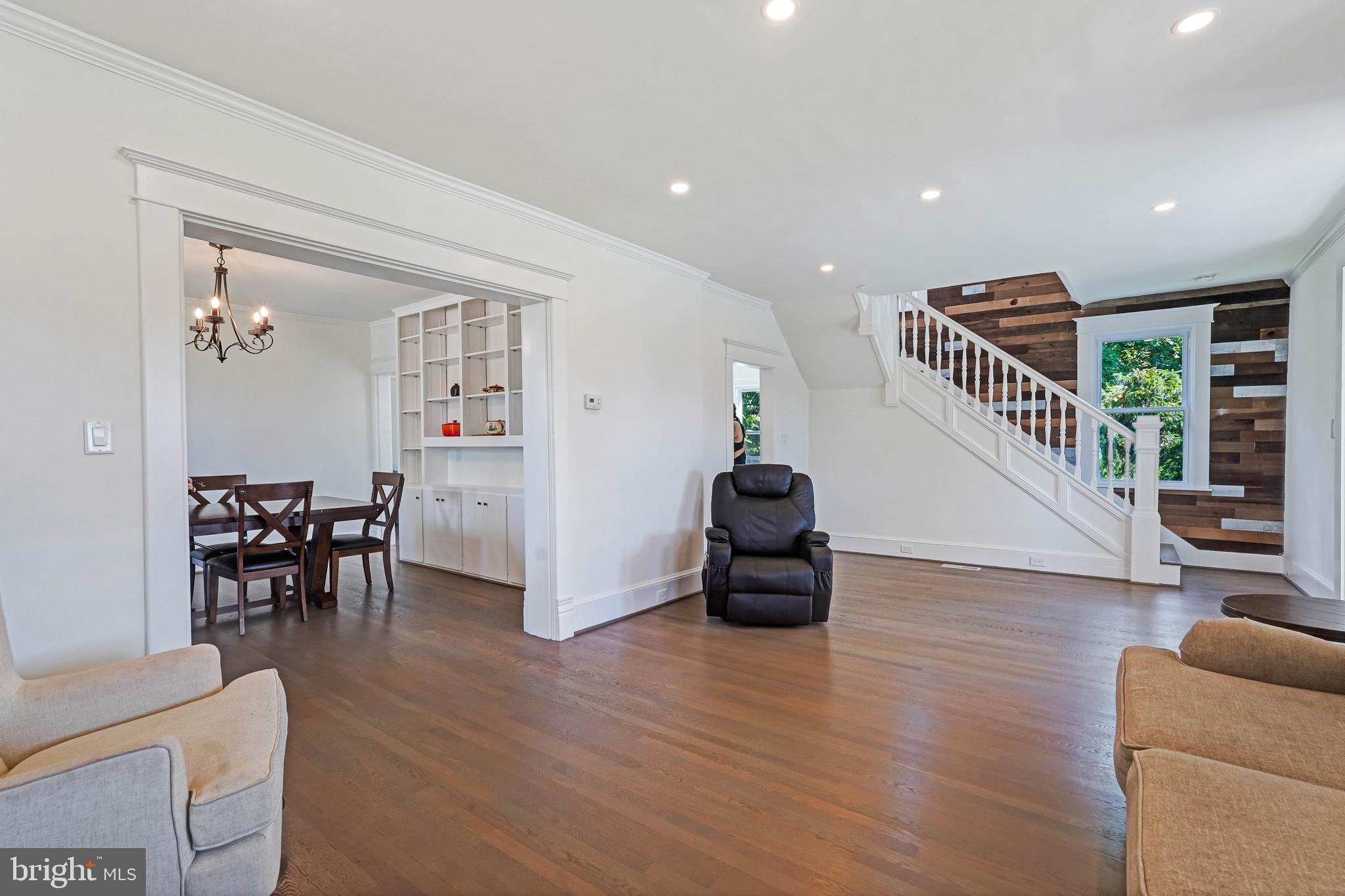 27100 Ridge Road Damascus, MD 20872 - Photo 21 of 74 a living room with furniture and a wooden floor