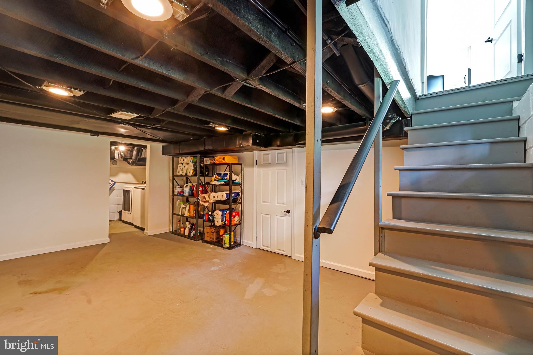 27100 Ridge Road Damascus, MD 20872 - Photo 45 of 74 a view of an empty room with storage