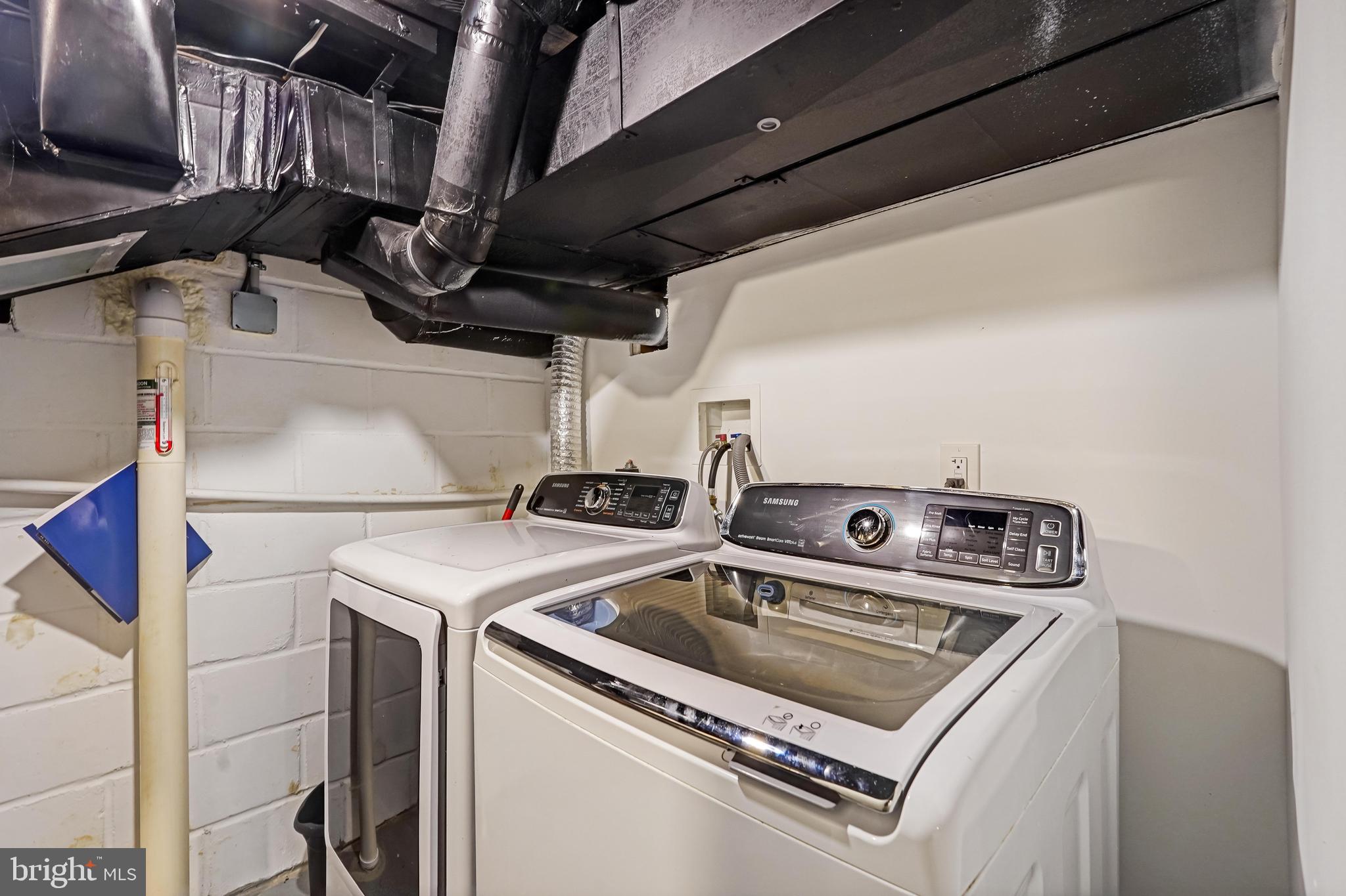 27100 Ridge Road Damascus, MD 20872 - Photo 46 of 74 a utility room with dryer and washer