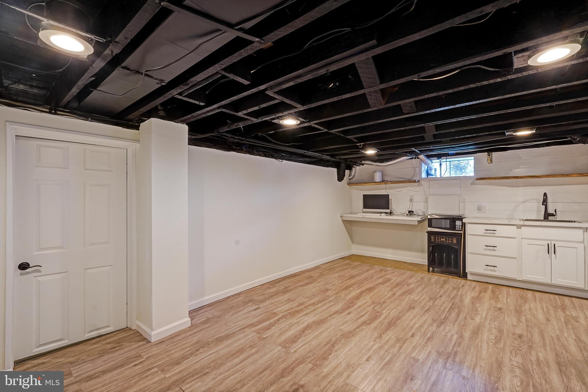 27100 Ridge Road Damascus, MD 20872 - Photo 47 of 74 Lower Level Basement Rec/Lounge Room with Wet Bar