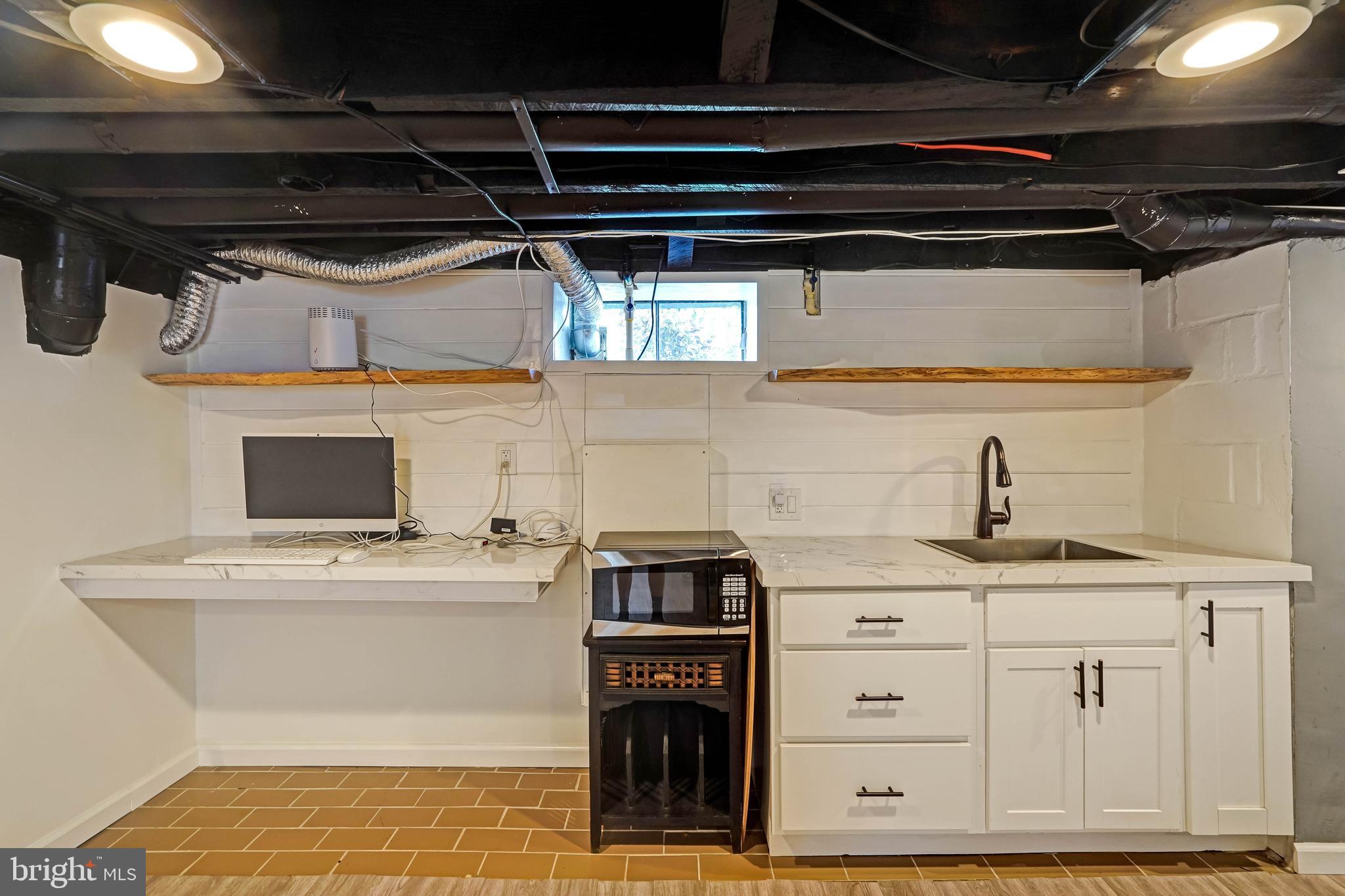 27100 Ridge Road Damascus, MD 20872 - Photo 48 of 74 Lower Level Basement Rec/Lounge Room with Wet Bar