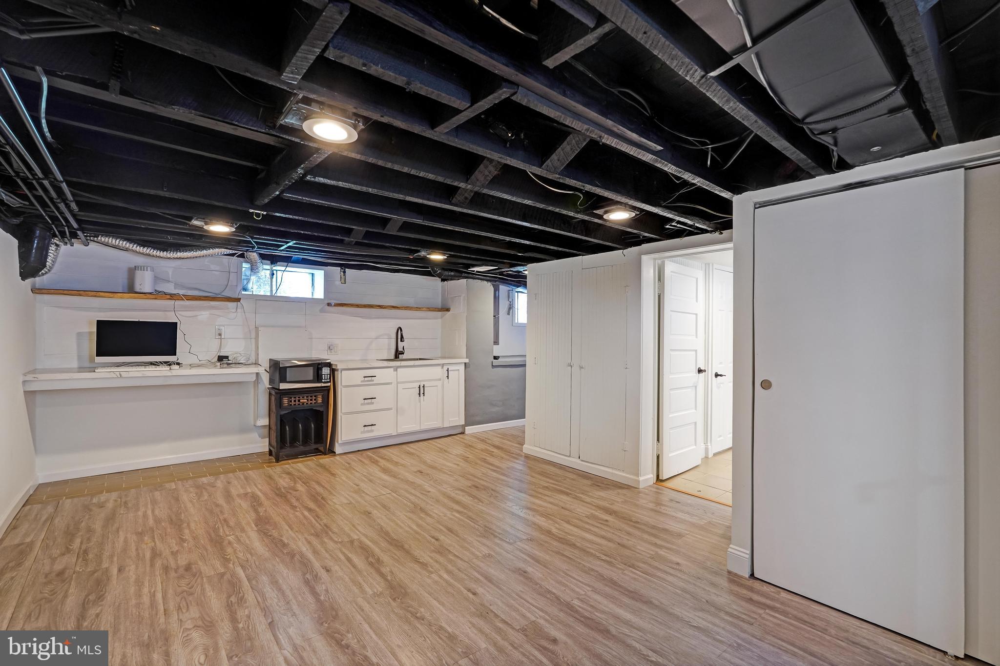 27100 Ridge Road Damascus, MD 20872 - Photo 50 of 74 Lower Level Basement Rec/Lounge Room with Wet Bar