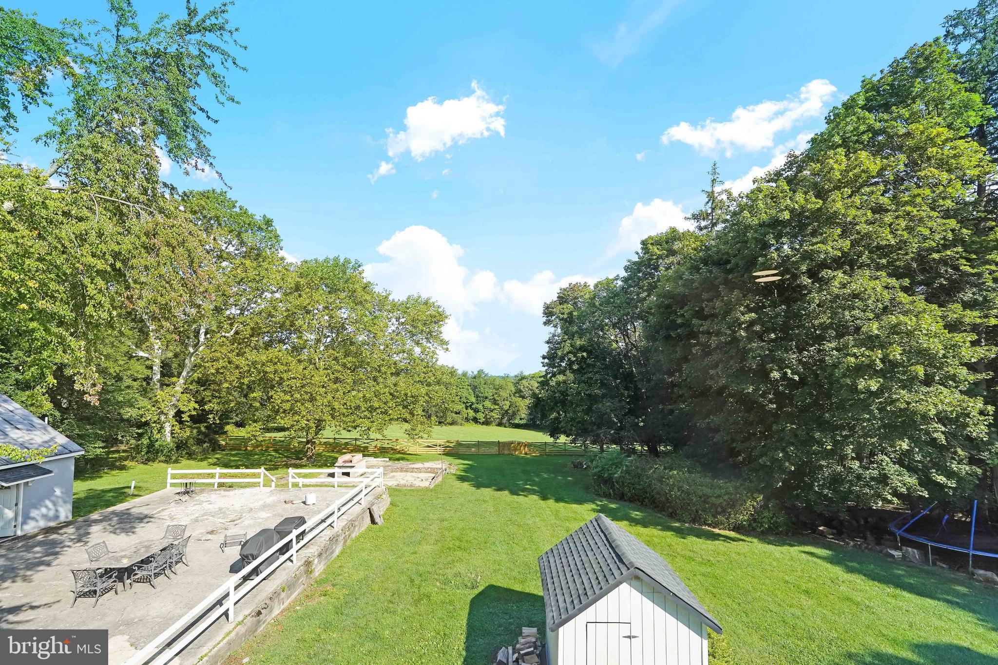 27100 Ridge Road Damascus, MD 20872 - Photo 72 of 74 a view of a house with a yard