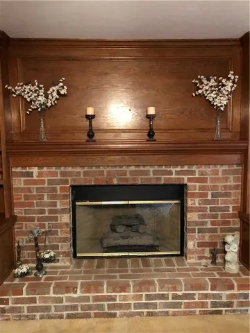 a living room with a fireplace