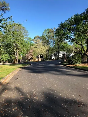 a view of a garden with a bench