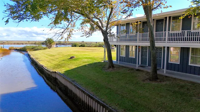 a view of swimming pool with a backyard