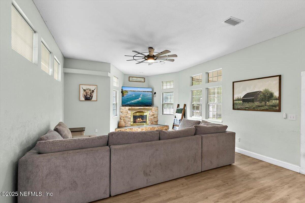 55214 Yellow Jacket Drive Callahan, FL 32011 - Photo 11 of 32 a living room with furniture and a large window