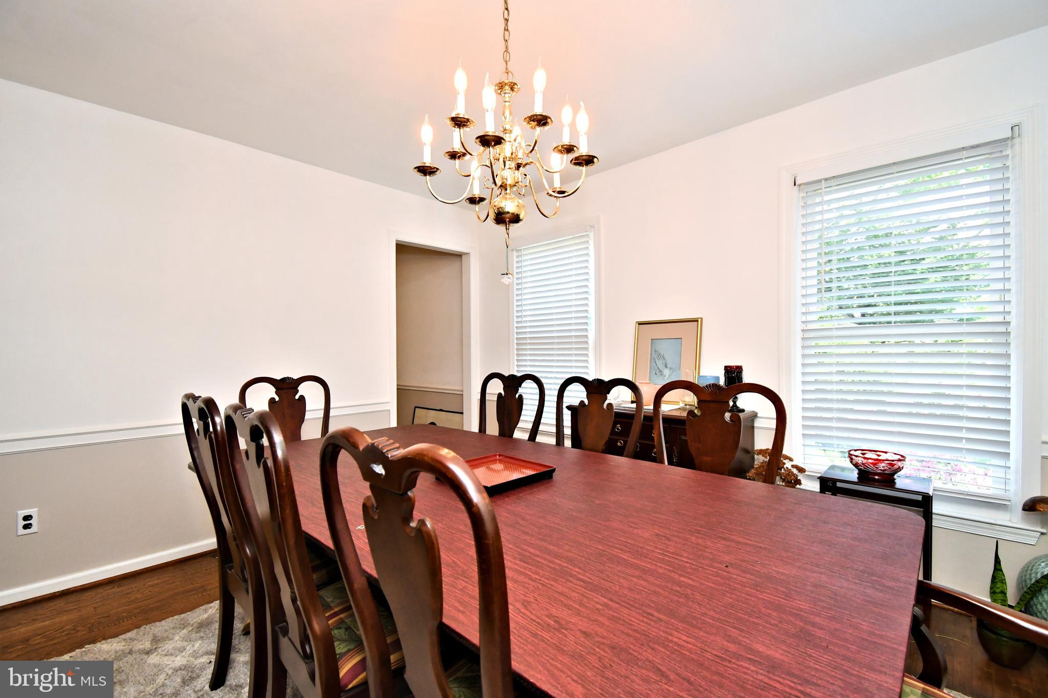 816 Glenn Circle Wayne, PA 19087 - Photo 12 of 63 a view of a dining room with furniture and chandelier