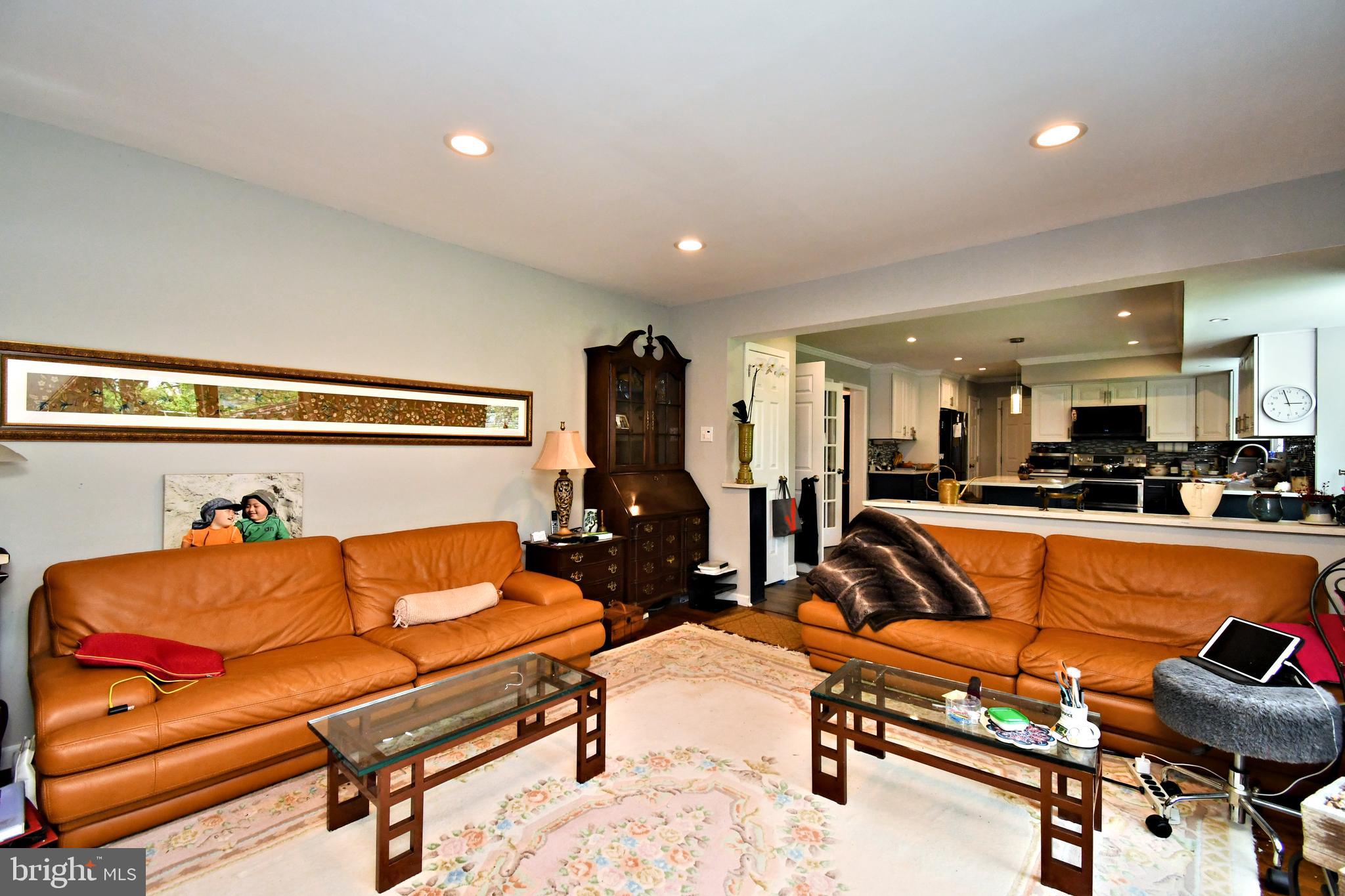 816 Glenn Circle Wayne, PA 19087 - Photo 26 of 63 a living room with furniture a rug and white walls
