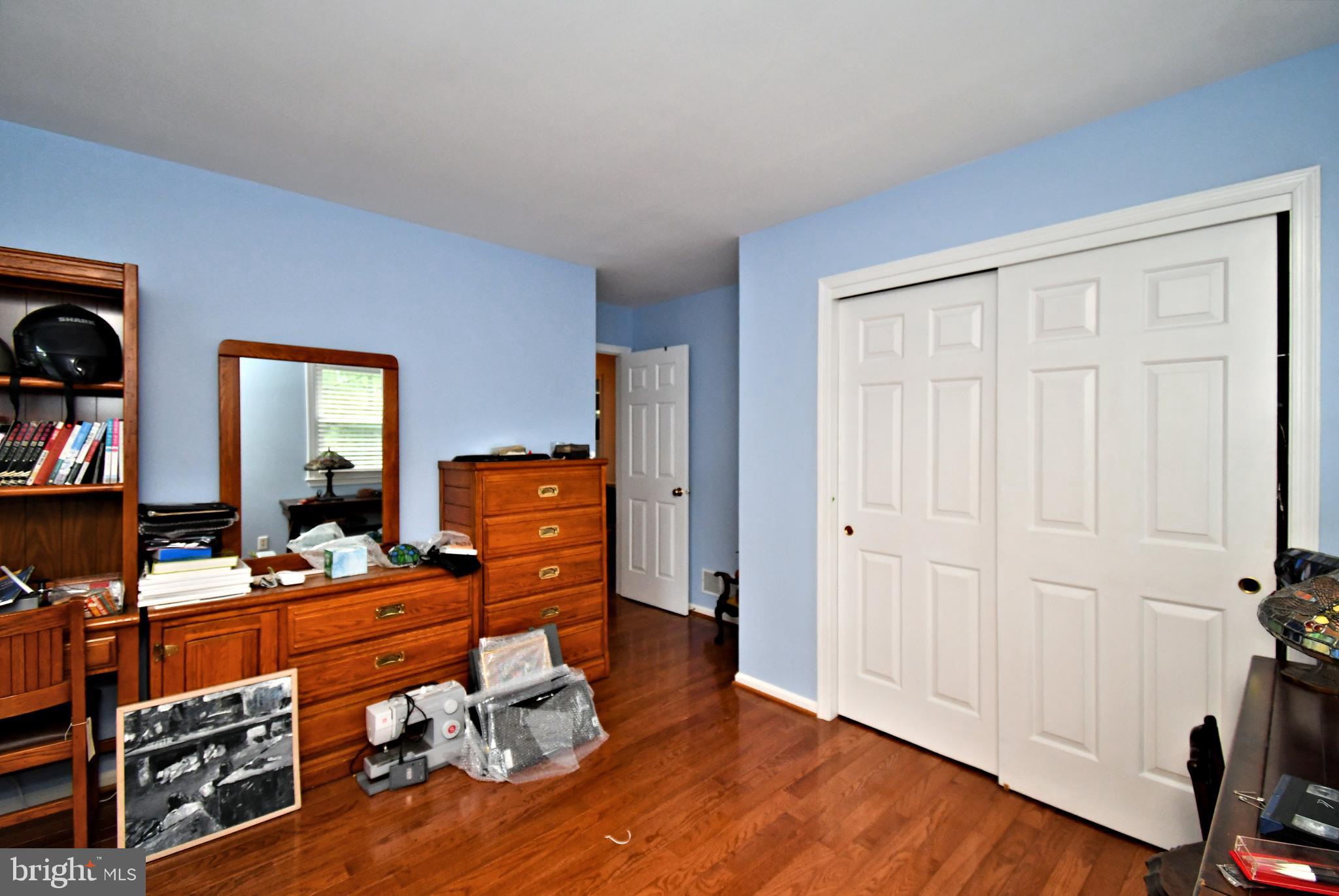 816 Glenn Circle Wayne, PA 19087 - Photo 35 of 63 a room with furniture and wooden floor