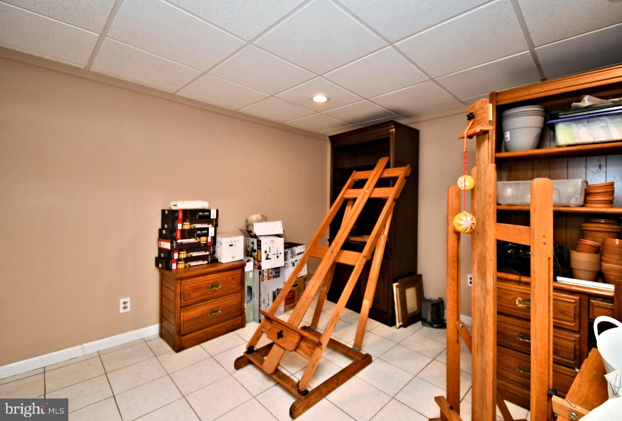 816 Glenn Circle Wayne, PA 19087 - Photo 43 of 63 a view of an empty room with wooden floor