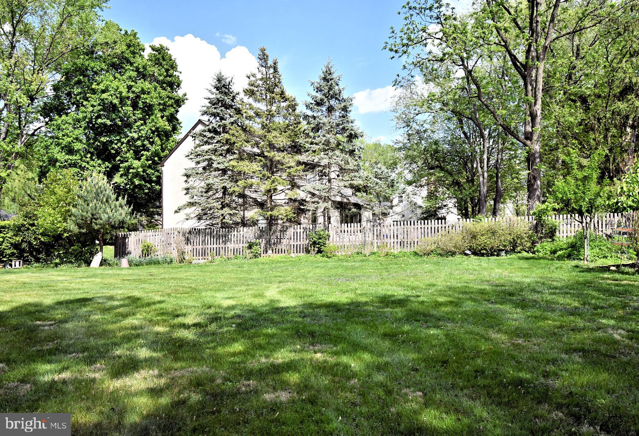 816 Glenn Circle Wayne, PA 19087 - Photo 61 of 63 a big yard with lots of green space and plants