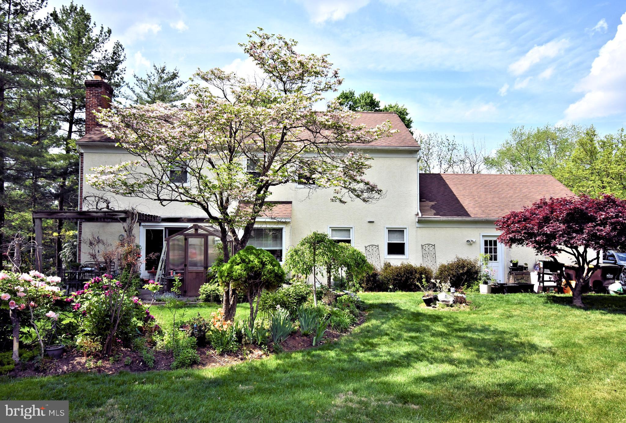 816 Glenn Circle Wayne, PA 19087 - Photo 62 of 63 a front view of a house with a garden