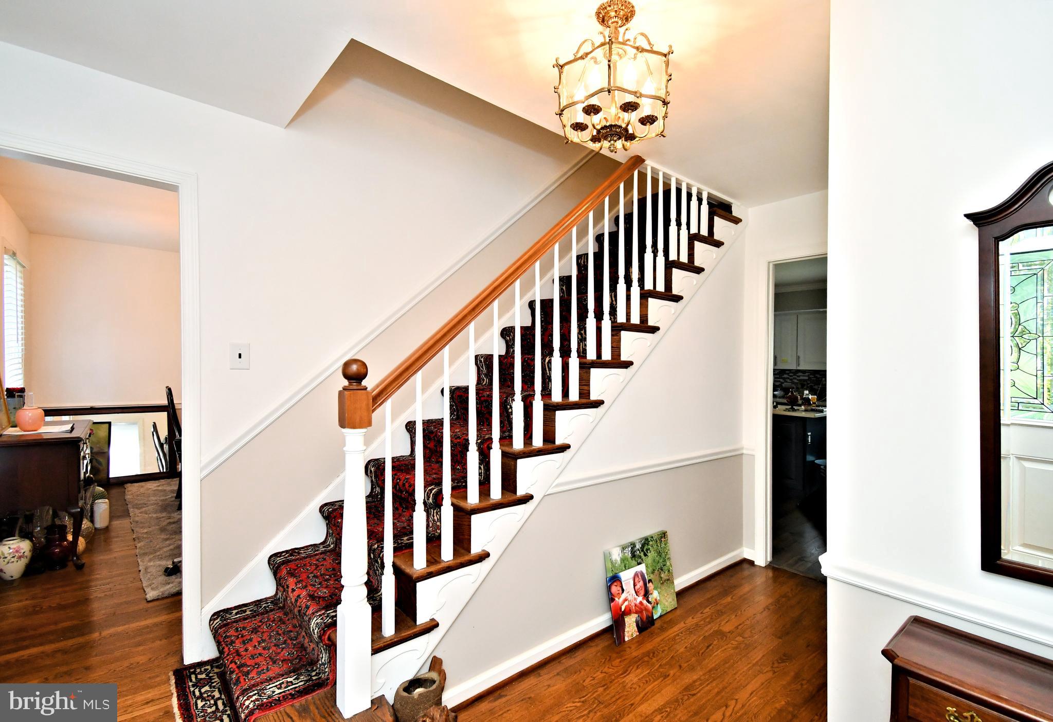 816 Glenn Circle Wayne, PA 19087 - Photo 7 of 63 a view of entryway and hall with wooden floor