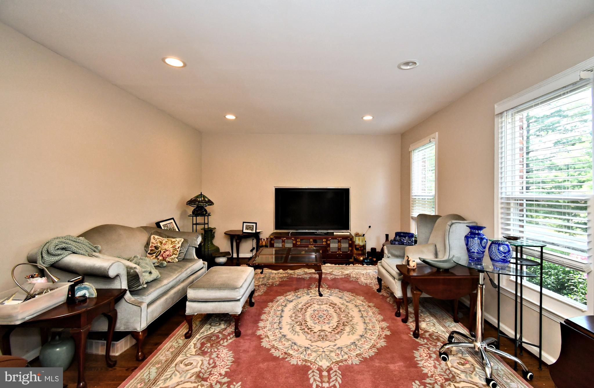 816 Glenn Circle Wayne, PA 19087 - Photo 10 of 63 a living room with furniture and a flat screen tv