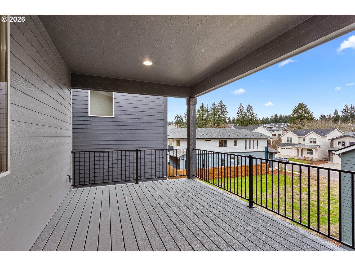 15666 Southwest Everglade Avenue Tigard, OR 97224 - Photo 24 of 45 a view of a balcony with wooden floor