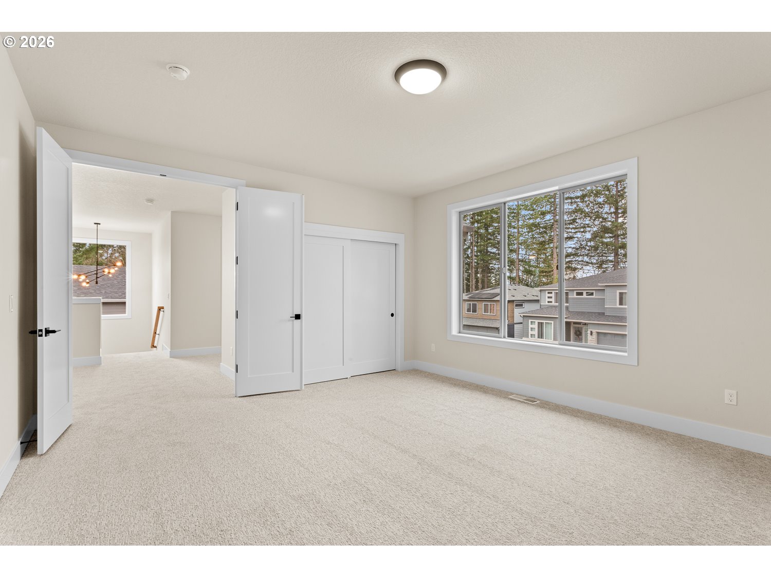 15666 Southwest Everglade Avenue Tigard, OR 97224 - Photo 33 of 45 a view of an empty room with a window