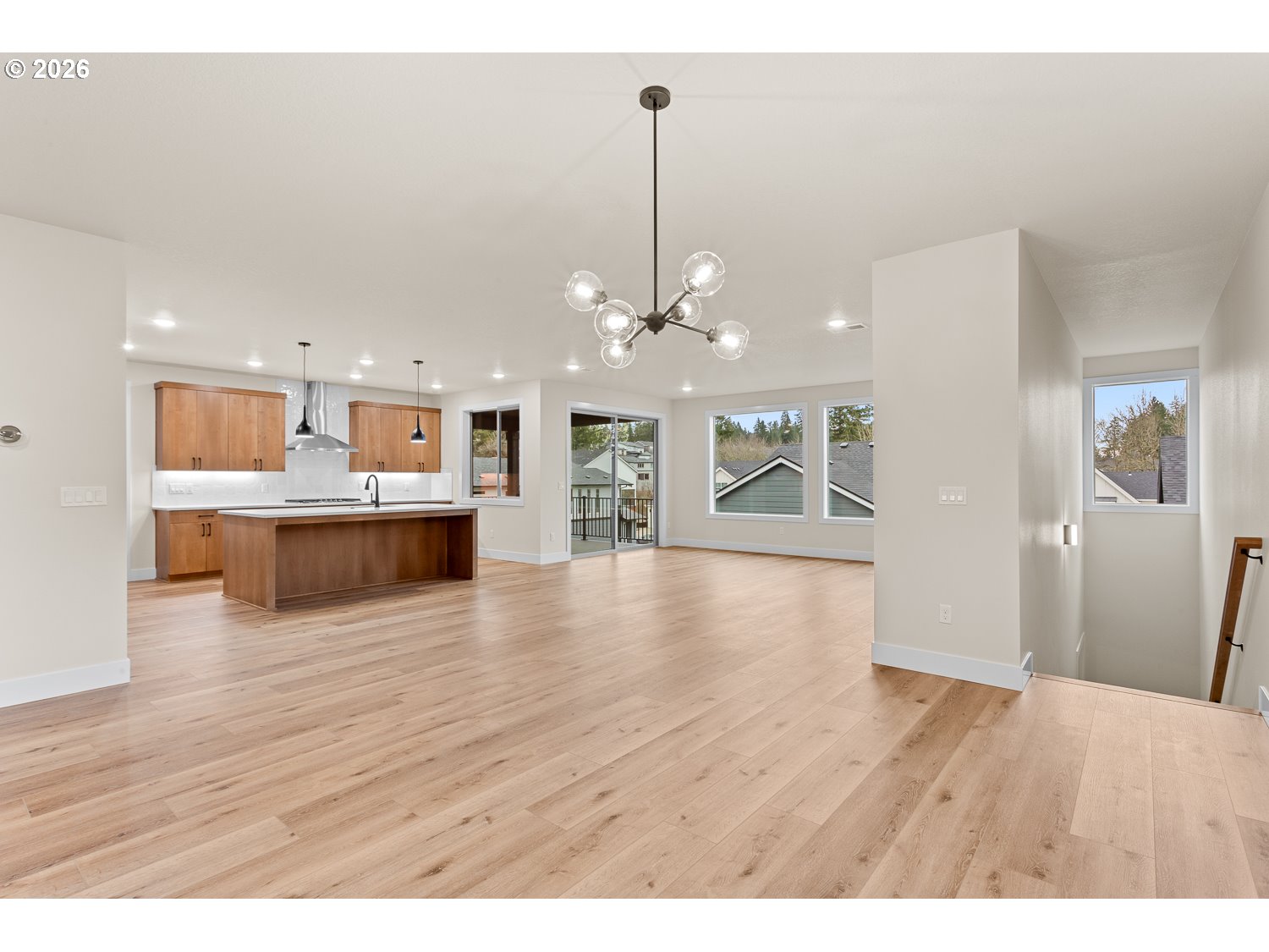 15666 Southwest Everglade Avenue Tigard, OR 97224 - Photo 10 of 45 a view of a kitchen with wooden floor and a kitchen