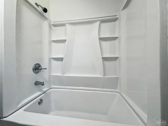 a close up of a bathtub