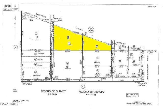 a black and white photo of a bathtub