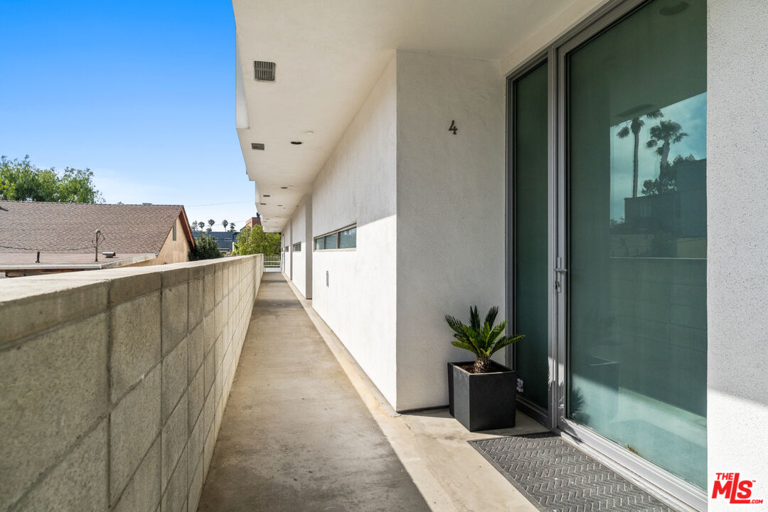 660 Rose Avenue, Unit 4 Venice, CA 90291 - Photo 2 of 25 a view of a balcony with furniture