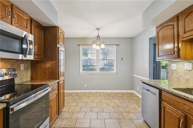 $369,950 | 9516 Woodson Drive, Overland Park, KS 66207