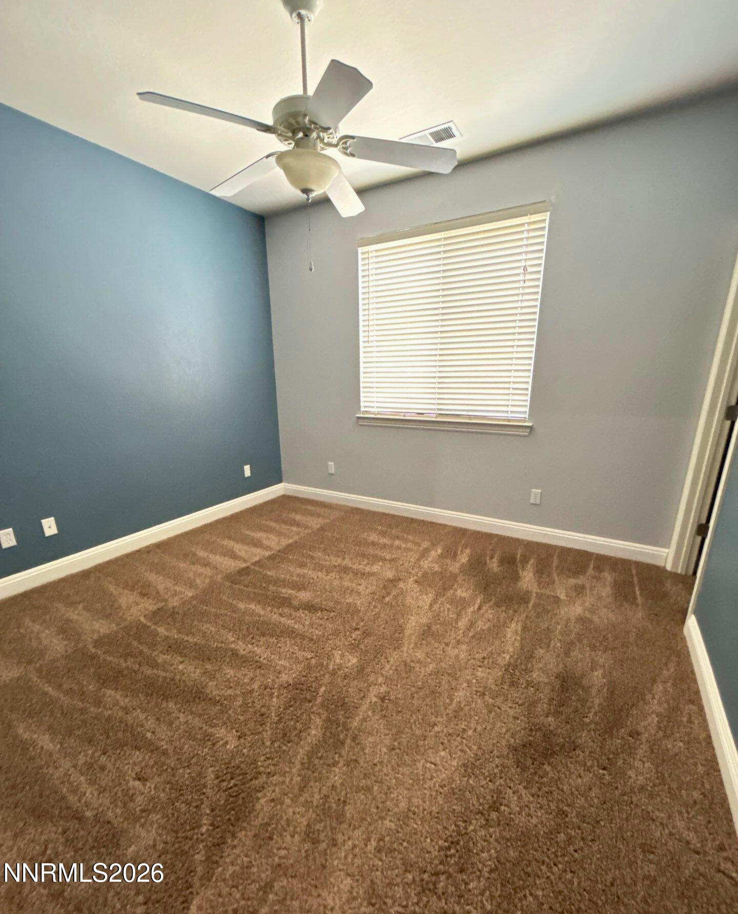 635 Ubaldo Court Reno, NV 89521 - Photo 18 of 22 an empty room with a window