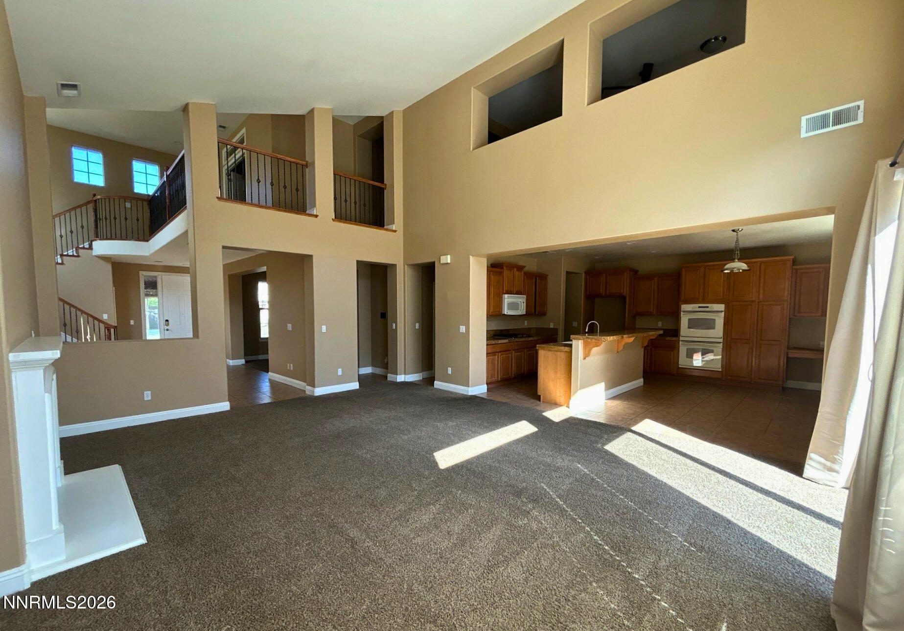 635 Ubaldo Court Reno, NV 89521 - Photo 5 of 22 a view of livingroom with furniture and windows