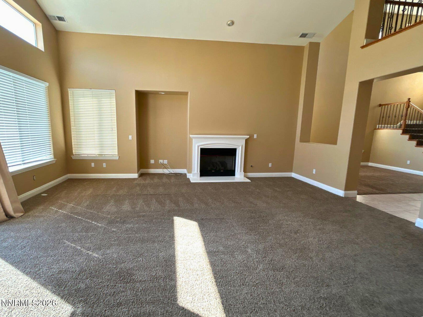 635 Ubaldo Court Reno, NV 89521 - Photo 9 of 22 an empty room with windows
