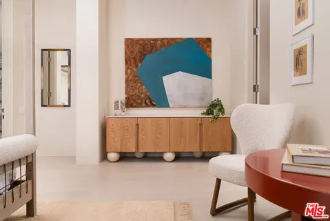 a living room with furniture and a couch