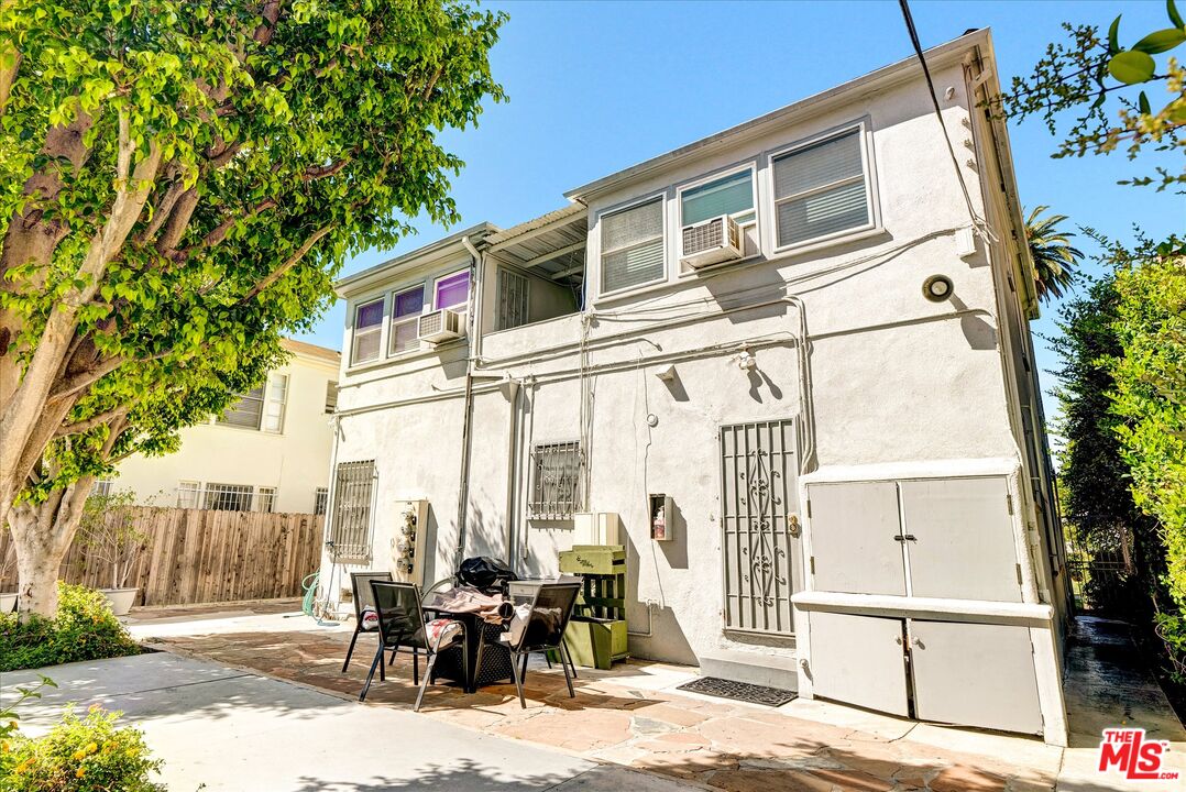 142 North Hamilton Drive, Unit A Beverly Hills, CA 90211 - Photo 8 of 8 a front view of a building with sitting area