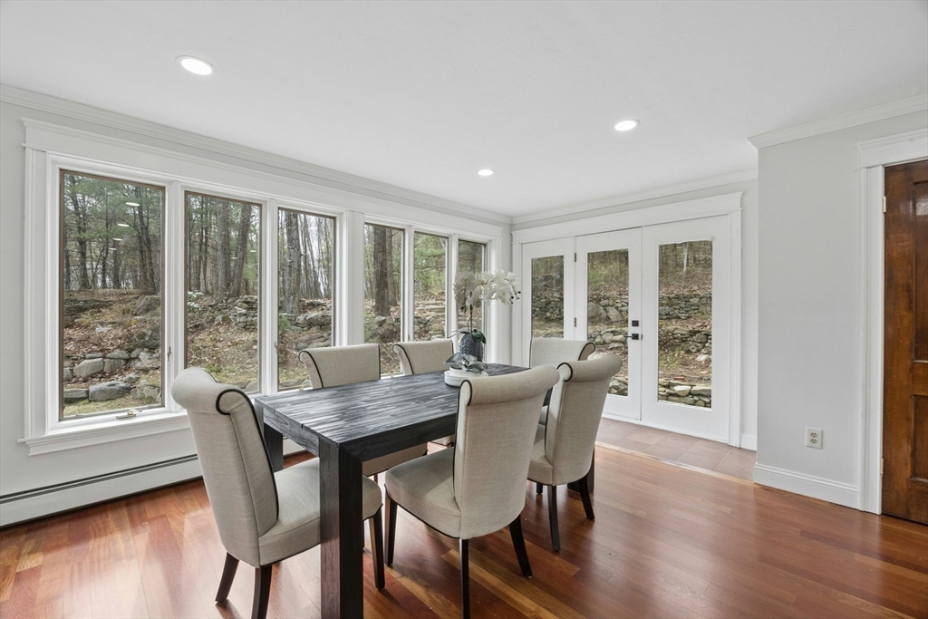 184 Old Bolton Road Stow, MA 01775 - Photo 7 of 39 a view of a dining room with furniture and wooden floor