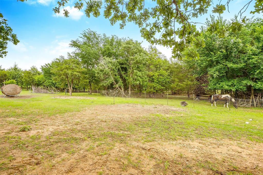 2700 East Fm 4 Cleburne, TX 76031 - Photo 20 of 33 a view of a swimming pool with a yard