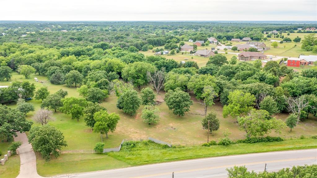 2700 East Fm 4 Cleburne, TX 76031 - Photo 3 of 33 an aerial view of residential houses with outdoor space and trees