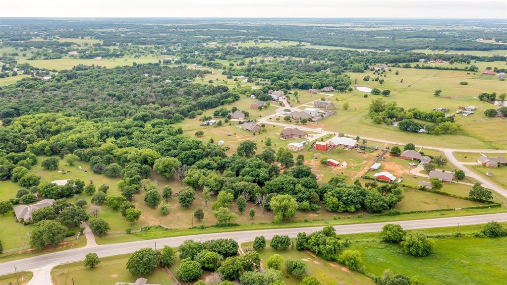 2700 East Fm 4 Cleburne, TX 76031 - Photo 6 of 33 an aerial view of lake and residential houses with outdoor space