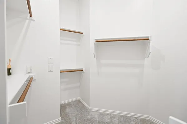 a bathroom with a double vanity sink mirror and