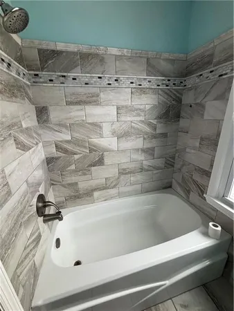 a bathroom with a bathtub