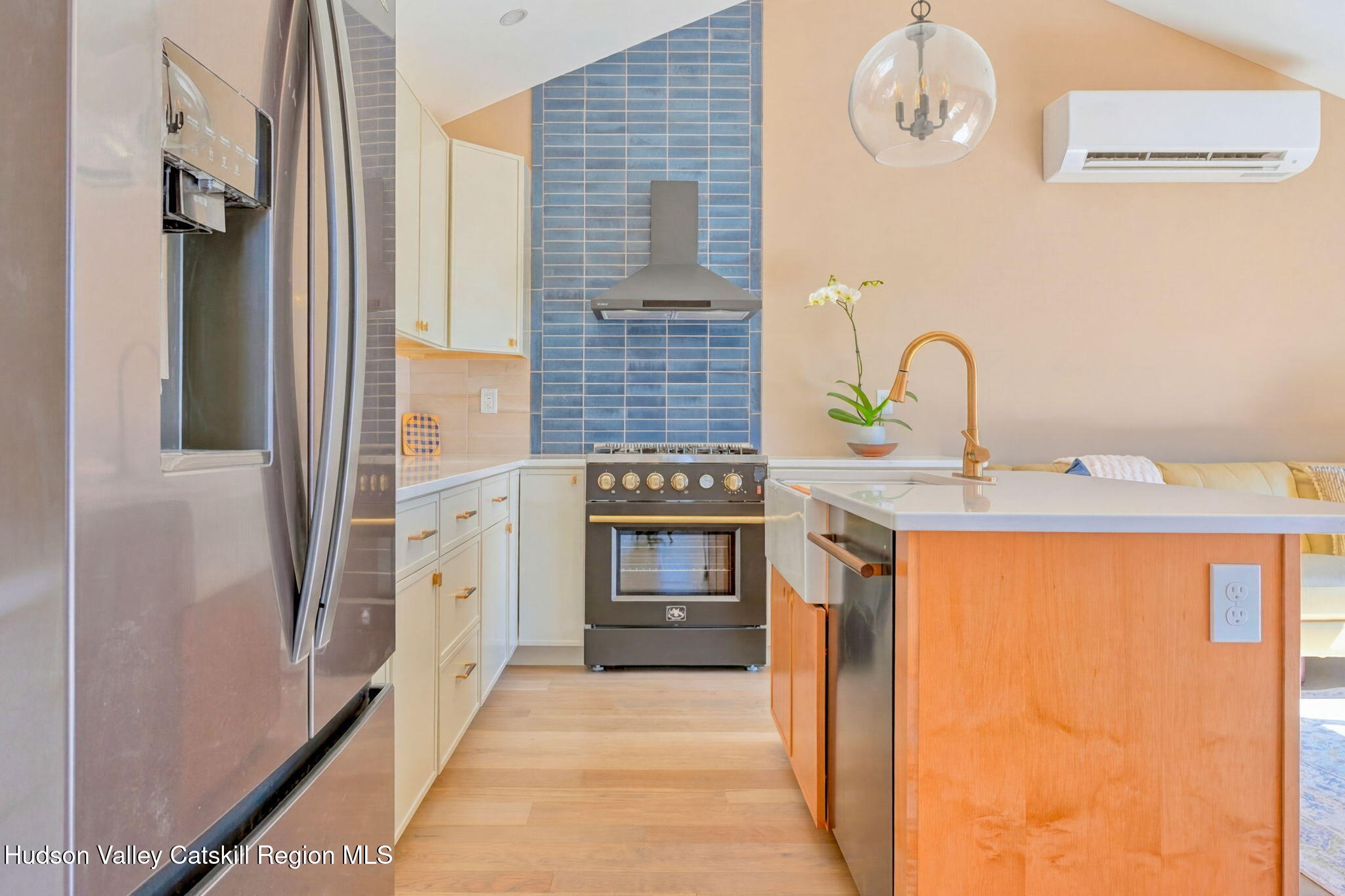 11 Mueller Road Saugerties, NY 12453 - Photo 14 of 36 a kitchen with stainless steel appliances a refrigerator and a stove